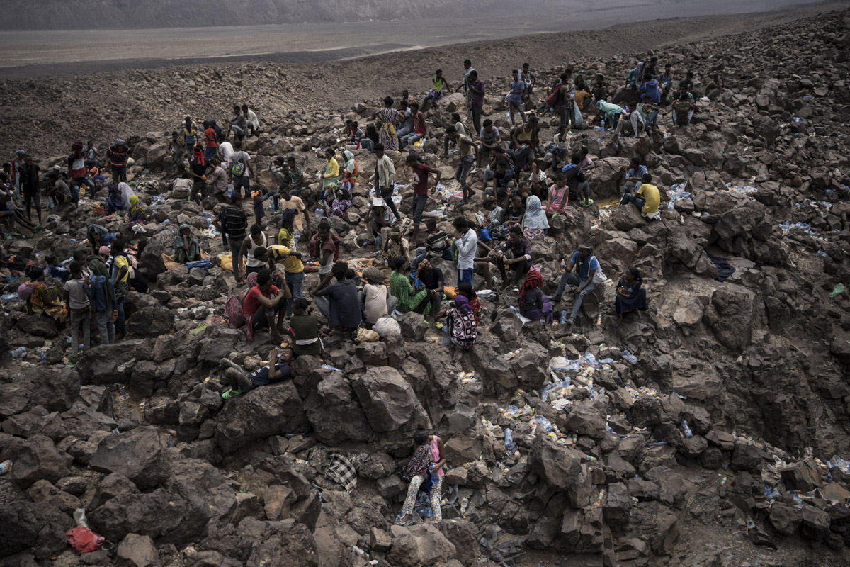 Hundreds of Oromo migrants smuggle across the mountainous border from Ethiopia to Djibouti.
It's one of the hottest regions in the world.
Galafi, Djibouti.
