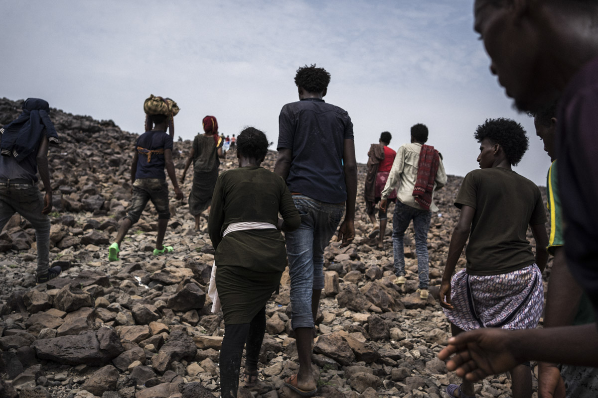 Hundreds of Oromo migrants smuggle across the mountainous border from Ethiopia to Djibouti.
It's one of the hottest regions in the world.
Galafi, Djibouti.