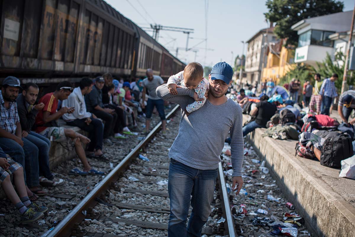 Gevgelia, July 6, 2015.
Ahmad is waiting on a train platform with few hundreds migrants to receive their 3-days residence permit.