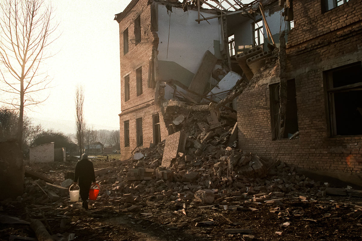 December 19th 1999.
 A school dating from the Soviet era and destroyed by an Russian air raid.
